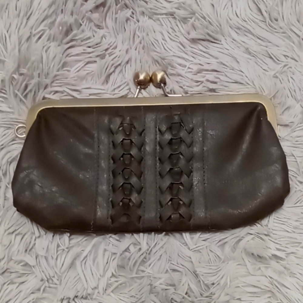 Beautiful brown leather clutch with braided detail and brass clasps